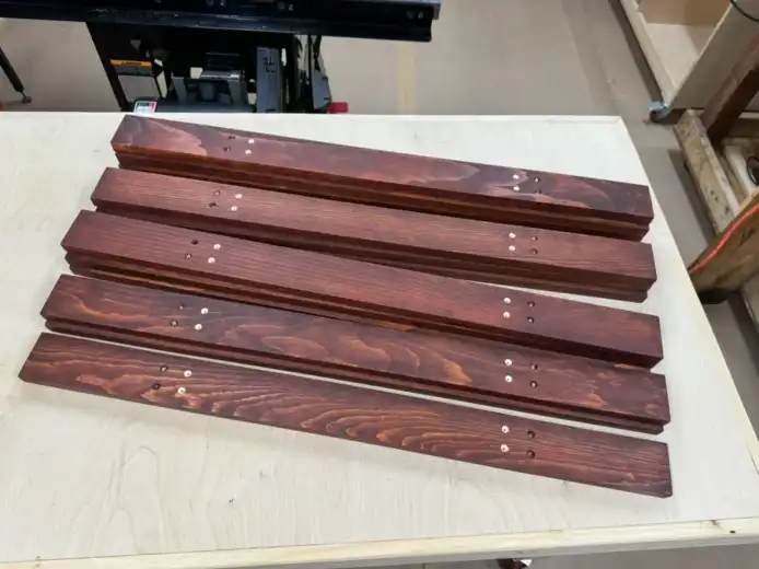 Planter boards with a second set of pre-drilled screw holes